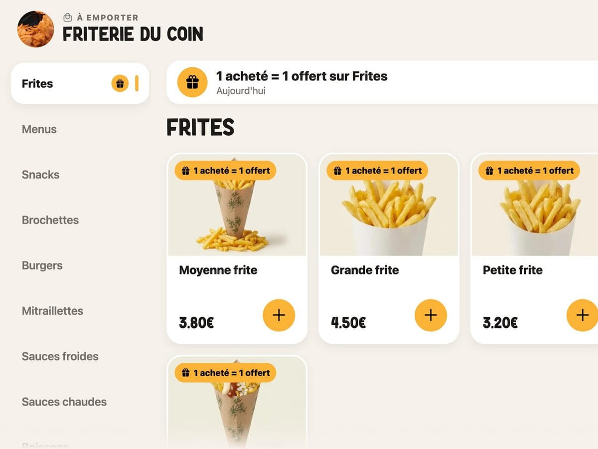 Kiosk screen: the fries menu with a buy one, get one free promotion